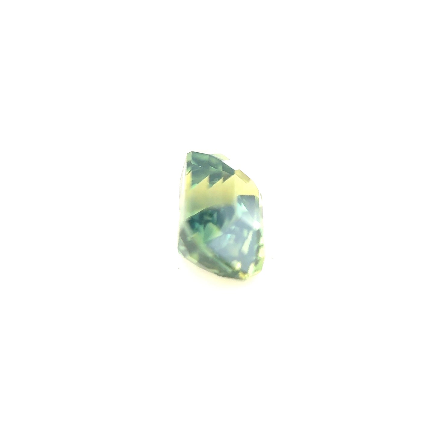 1.47ct Unheated Bi-colour Green Sapphire - 6.79 x 5.22 x 4.52mm